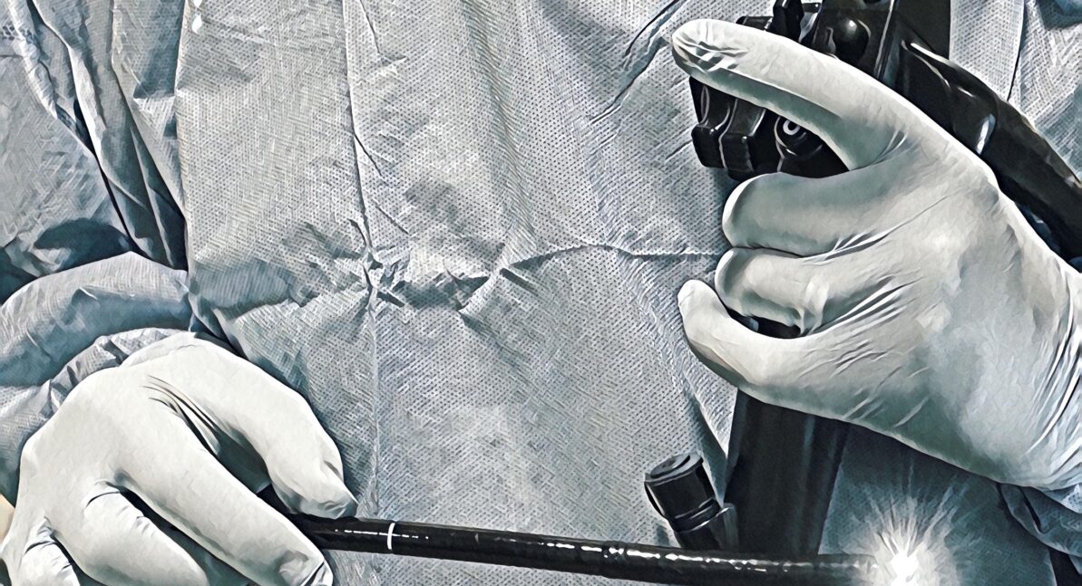 Close-up of a surgeon holding an endoscope, representing specialized websites for medical clinics and healthcare professional